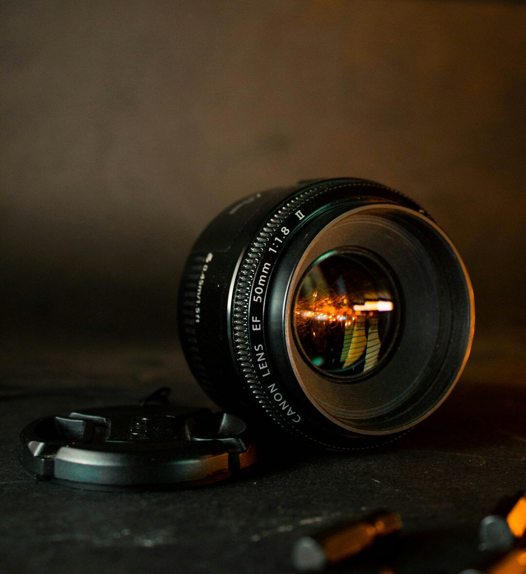 Close up of broadcast camera lens and equipment case